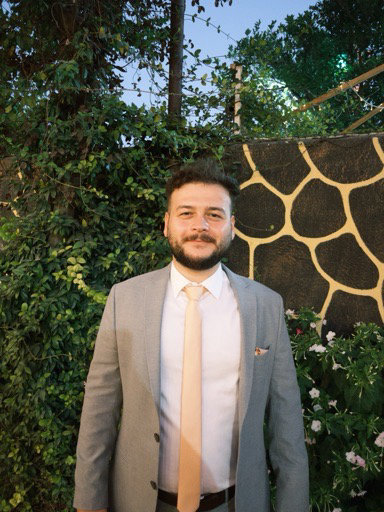 Murat E.